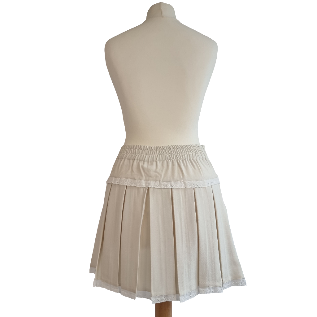 Cream Pleated Mini Skirt with Lace Trim and Satin Ribbon Bows