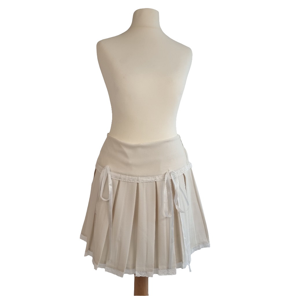 Cream Pleated Mini Skirt with Lace Trim and Satin Ribbon Bows