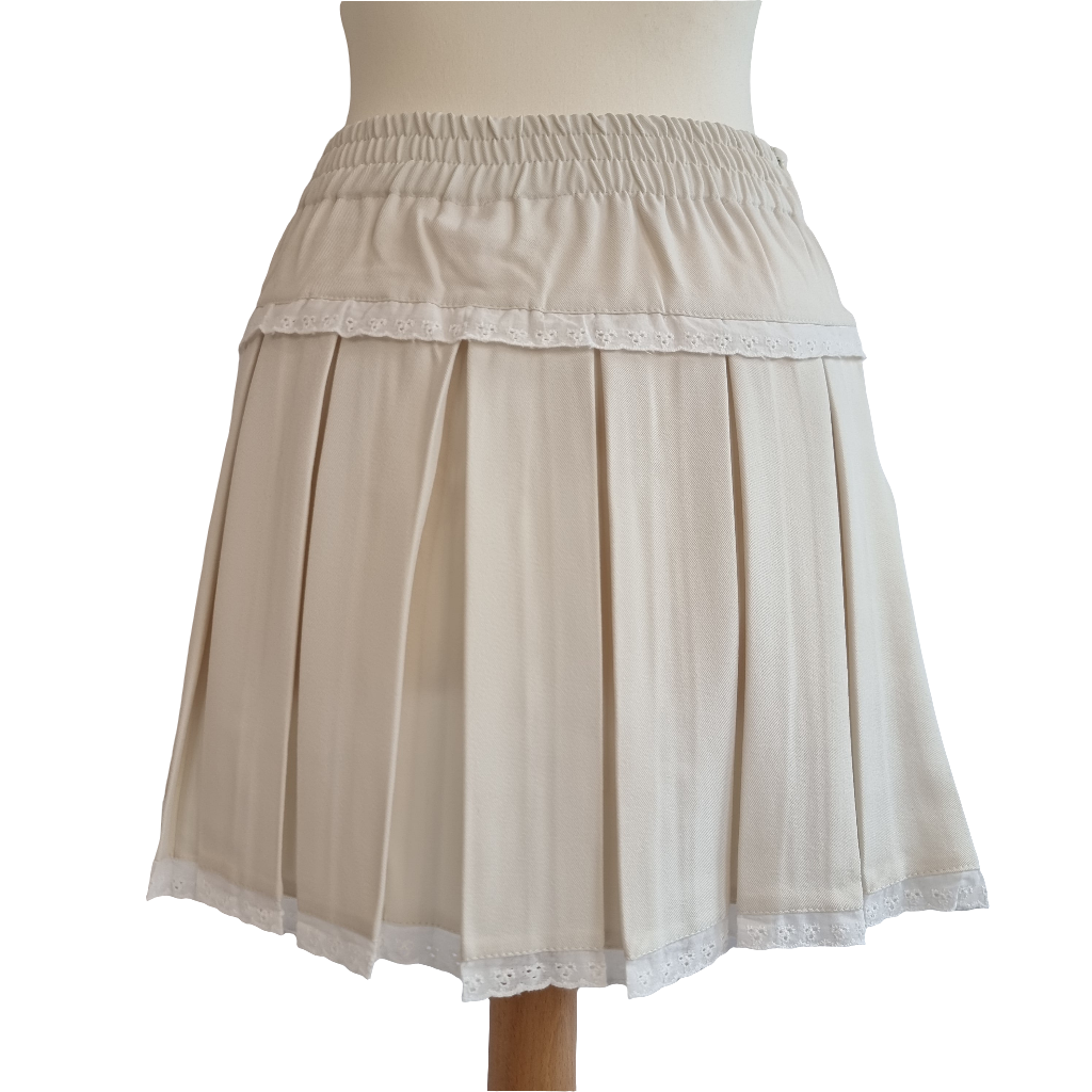 Cream Pleated Mini Skirt with Lace Trim and Satin Ribbon Bows