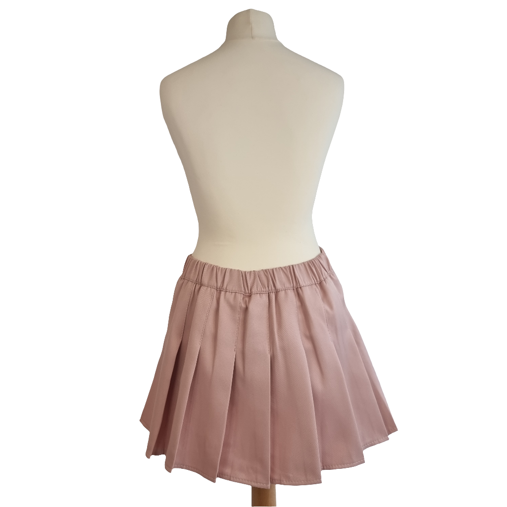 Blush Pink Pleated Mini Skirt with Black Ribbon Bow Accents