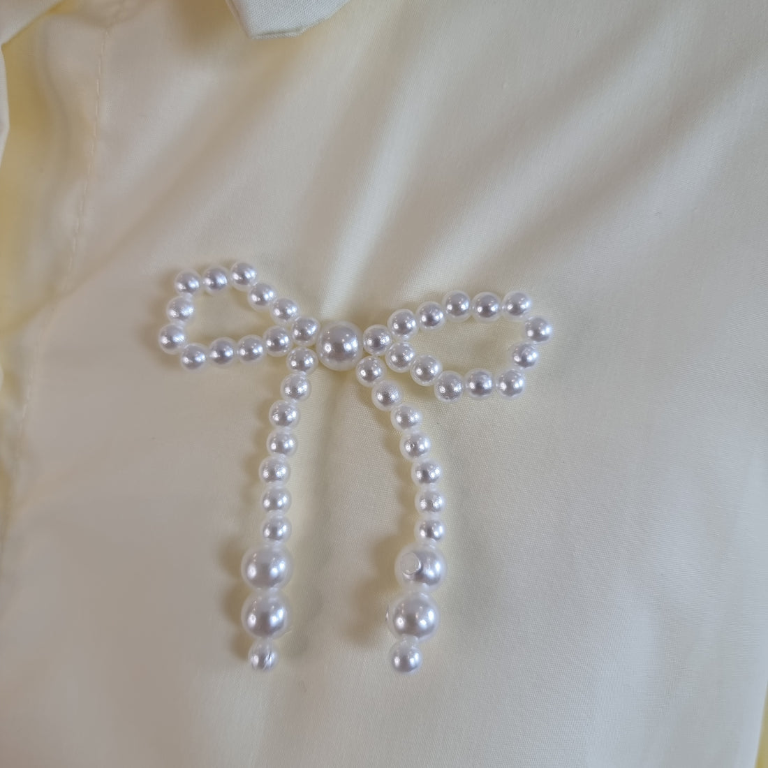 Pearl Bow Charm Blouse Pastel Yellow