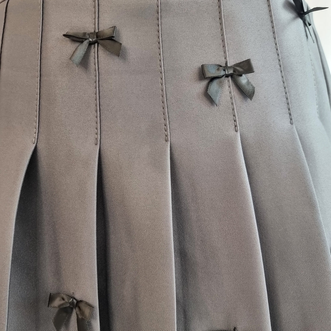 Charcoal Gray Pleated Mini Skirt with Black Bow Details