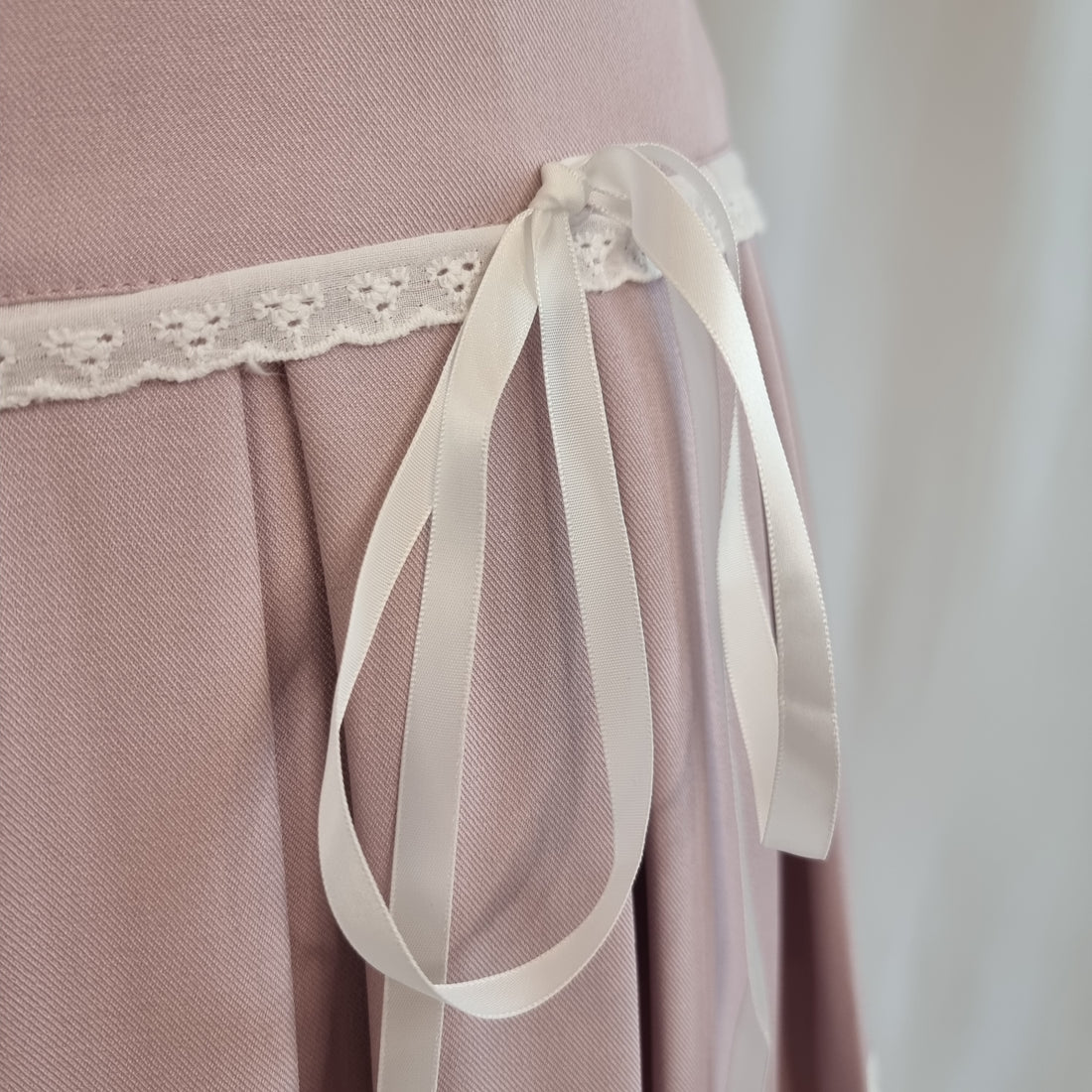 Lilac Pleated Skirt with Lace Trim and Satin Ribbons